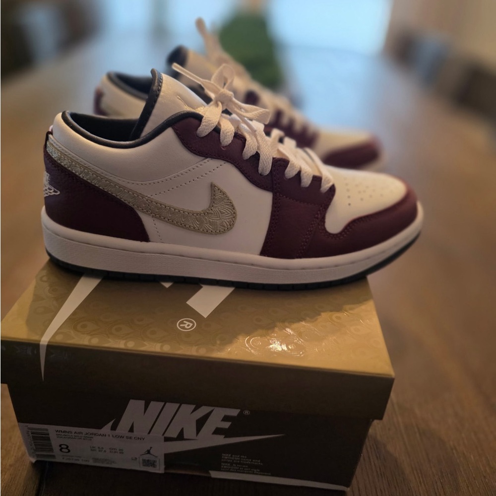 Jordan 1 low.. CNY.. Red and White Sneakers Classic High-Top Design